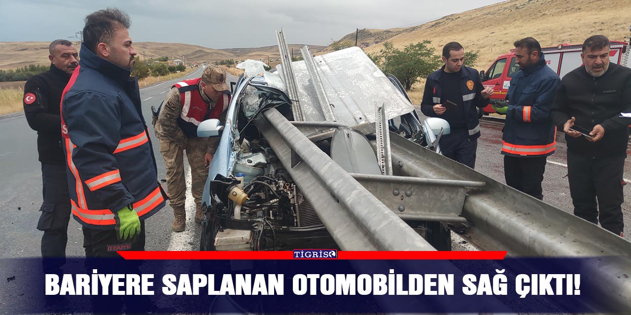 Bariyere saplanan otomobilden sağ çıktı!