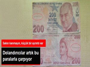 Üzerinde 'Geçersizdir' yazan para ile fena dolandırdı